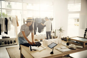 Women take measurement of Customer